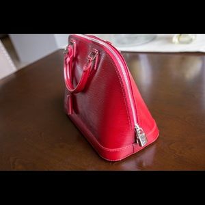 Louis Vuitton authentic bag. Epi leather.